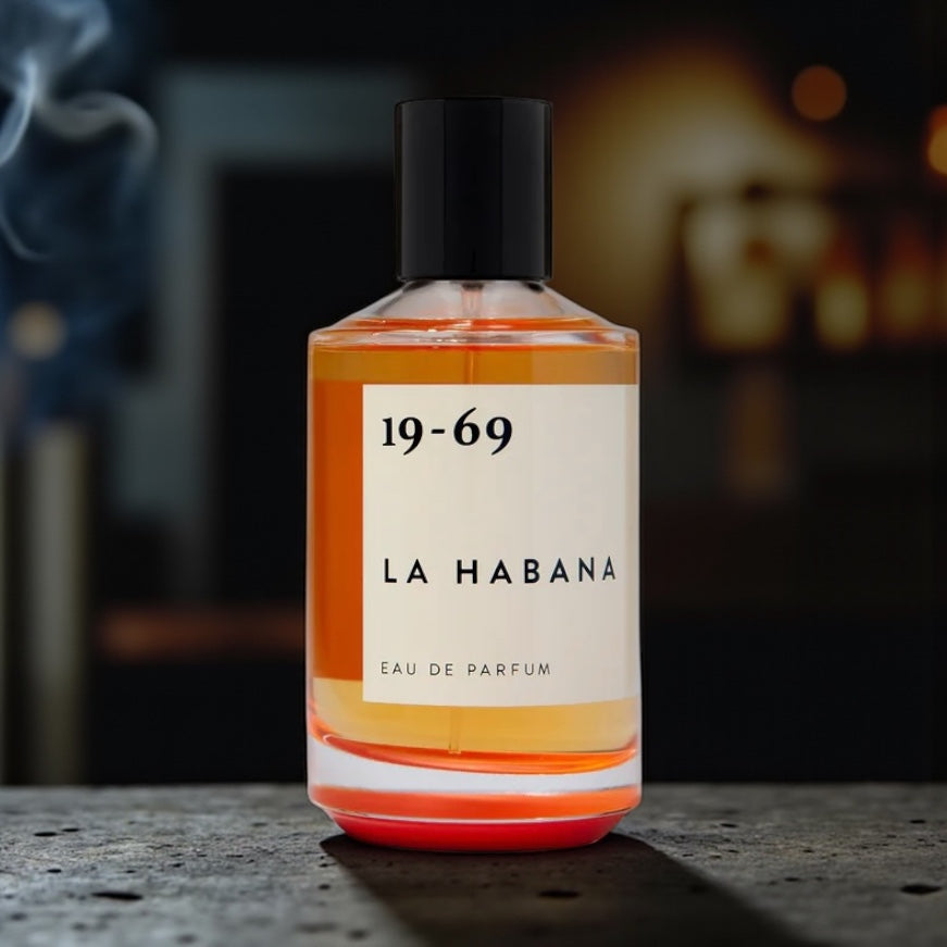 19-69 La Habana perfume sample – smoky amber and oud notes styled with warm golden tones inspired by vintage Havana nights.