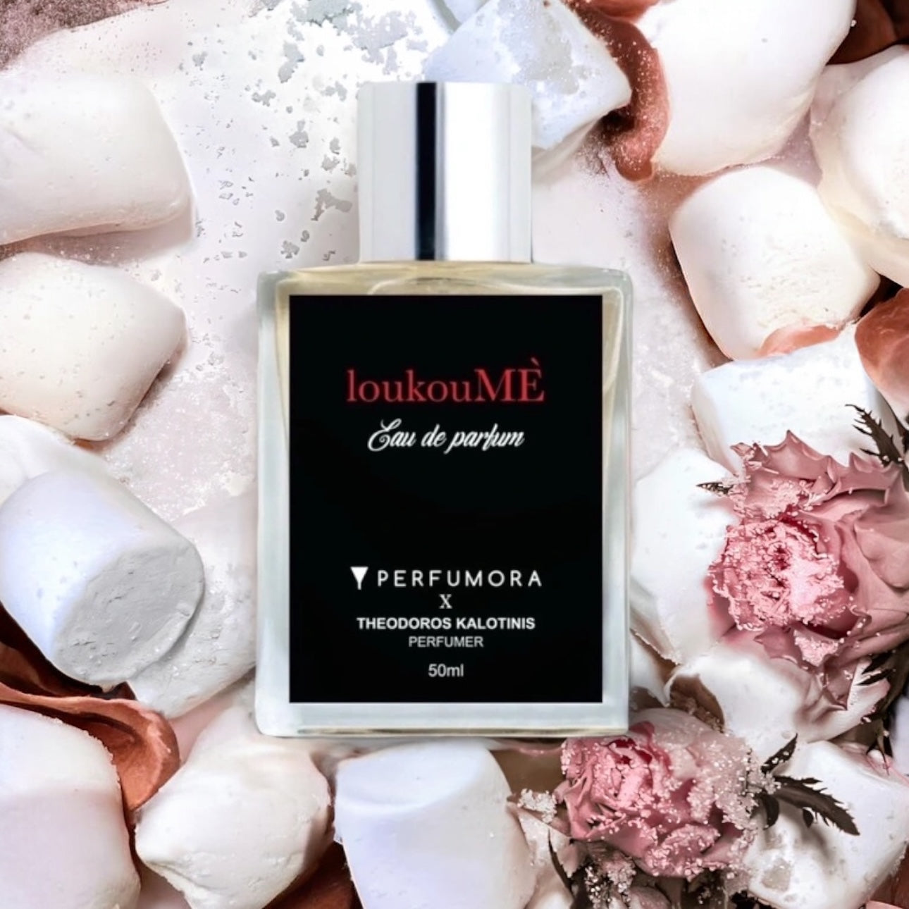 Close-up of a LoukouMÈ perfume sample, featuring its sweet blend of cotton candy, neroli, dulce de leche, and white musk, available in decants and testers.