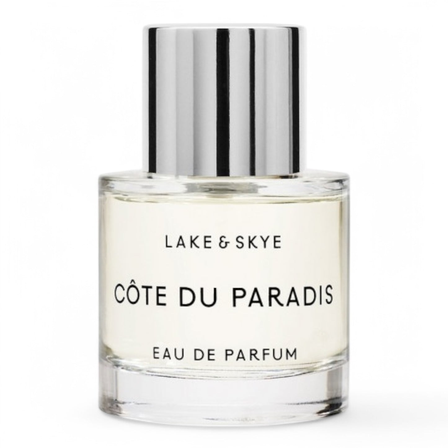 A decant of Lake & Skye Côte du Paradis, a warm woody gourmand fragrance with palo santo, almond, and vanilla, available in perfume samples