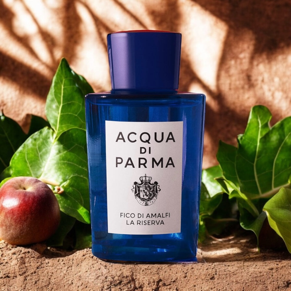 Fico di Amalfi La Riserva perfume sample - fig pulp and sunlit citrus extrait styled in a warm, luxurious Amalfi-inspired setting