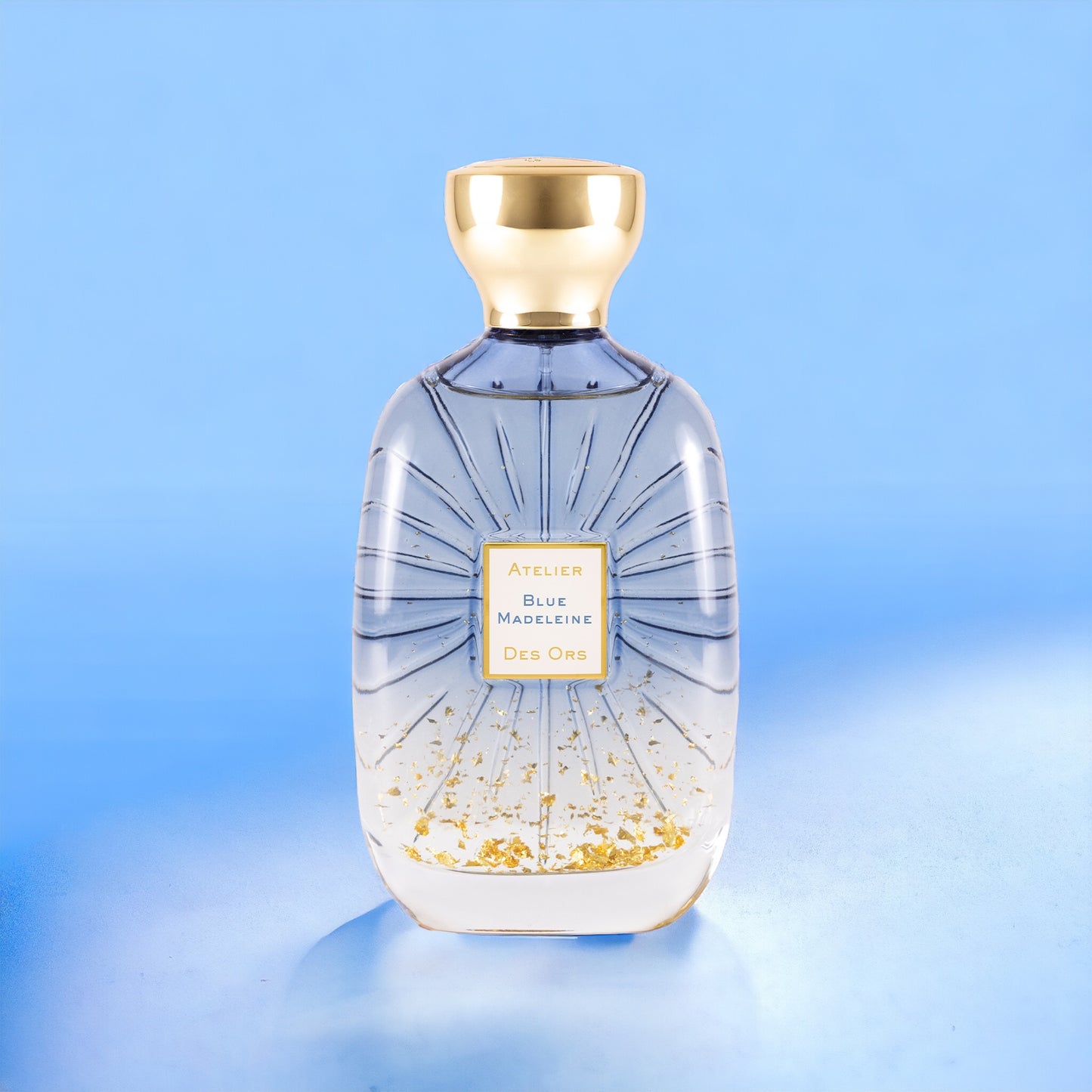 Blue Madeleine perfume sample – cosy black tea, soft rose and smoky woods in an elegant afternoon tea setting.