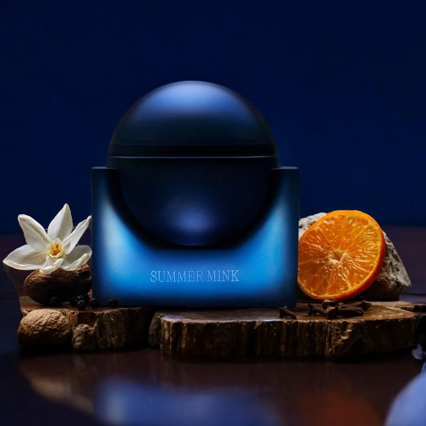 Better World Fragrance House Summer Mink perfume sample - playful rose and candy-like musk fragrance styled in a moody setting