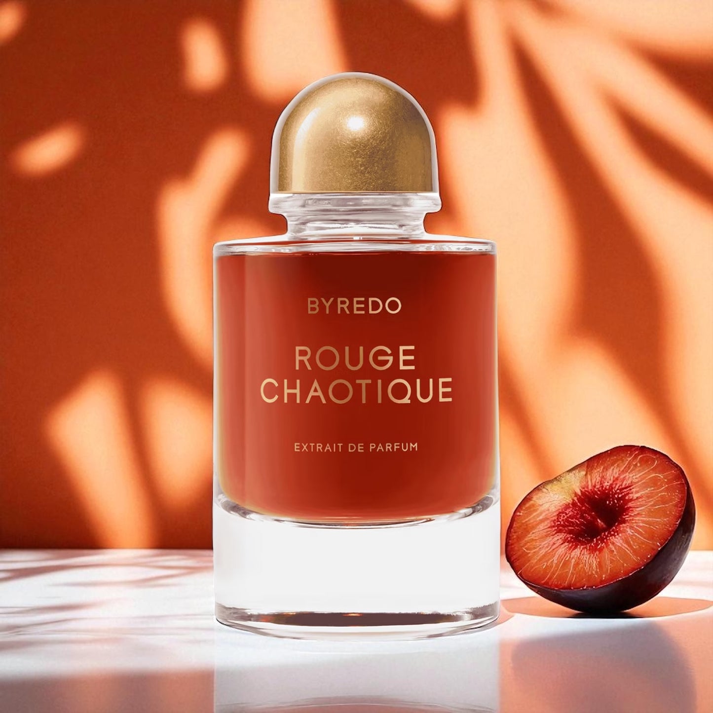 Byredo Rouge Chaotique 2025 perfume sample – juicy plum, praline and smoky patchouli in a bold, sensual warm setting.