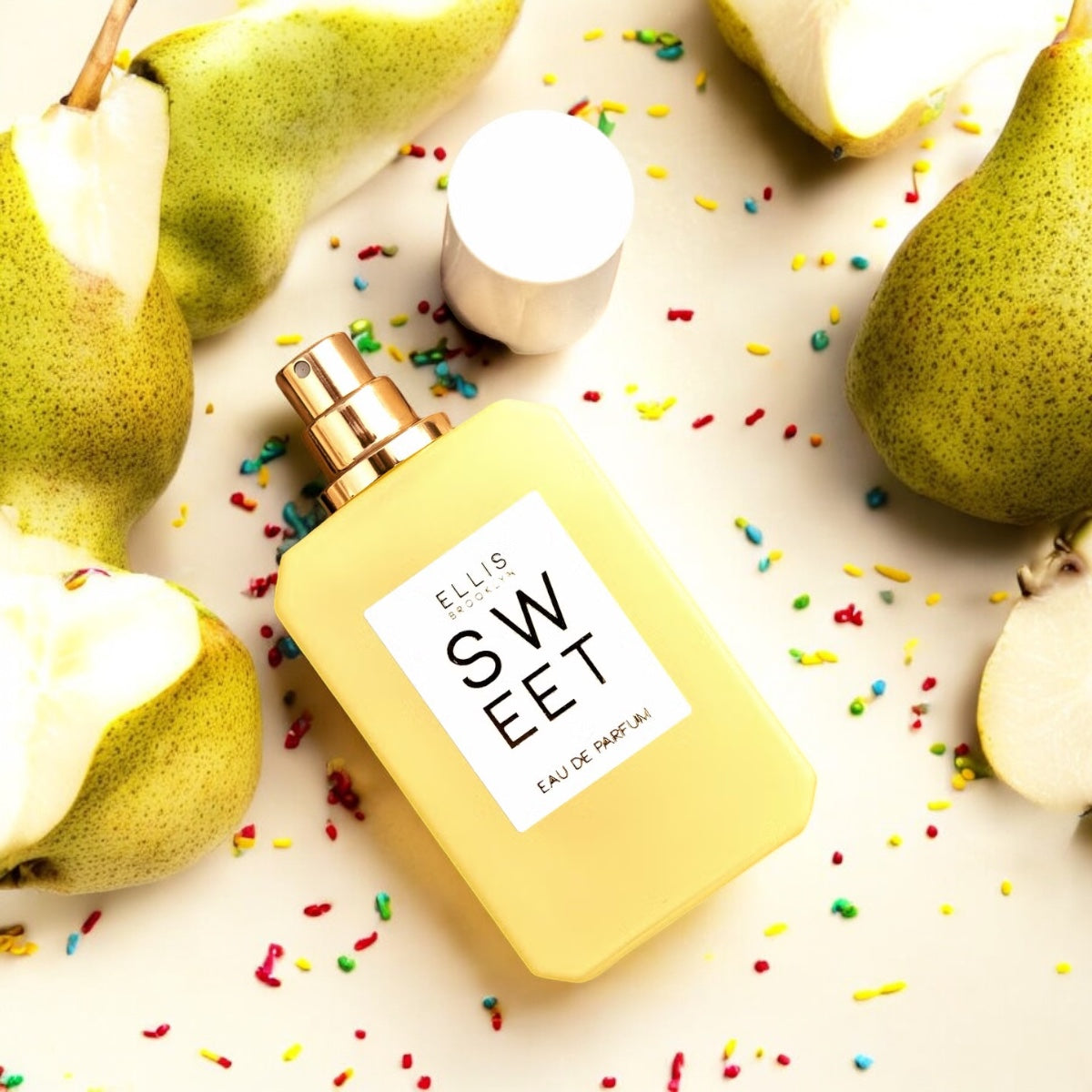 Ellis Brooklyn Sweet perfume sample in a bright, playful setup – soft musk and marshmallow meet fresh pear for a joyful vibe