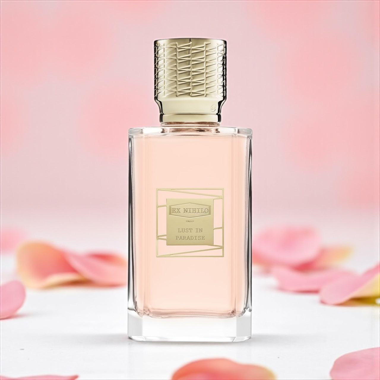 Ex Nihilo Lust in Paradise perfume sample – radiant peony, lychee, and musk notes styled in a sunlit floral setting.