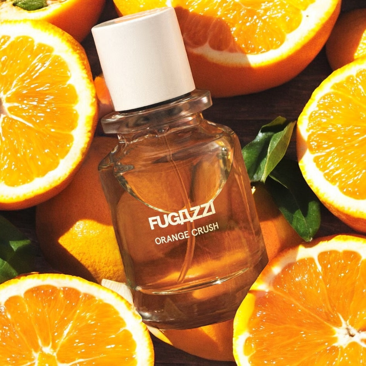 Fugazzi Orange Crush perfume sample - bright orange and minimalist amber notes in a warm, sunlit lifestyle setting