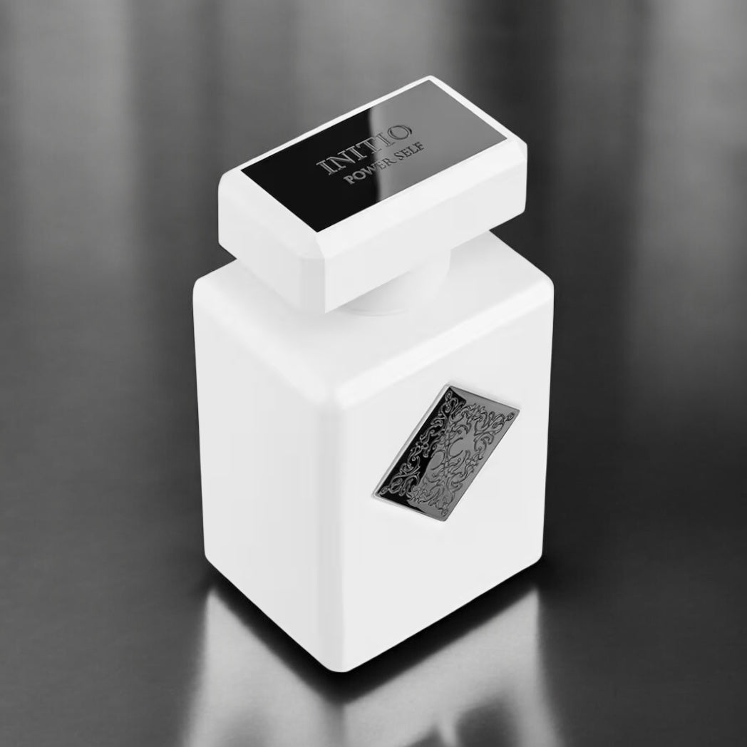Initio Power Self fragrance sample – white flowers, musk and cedarwood styled in a modern lifestyle setting.