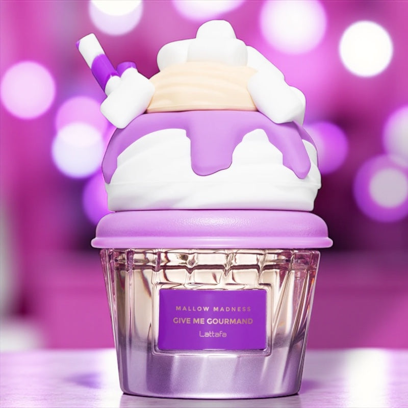 Lattafa Mallow Madness perfume sample – marshmallow, strawberry and vanilla cream notes styled in a playful pastel-toned dessert setting.