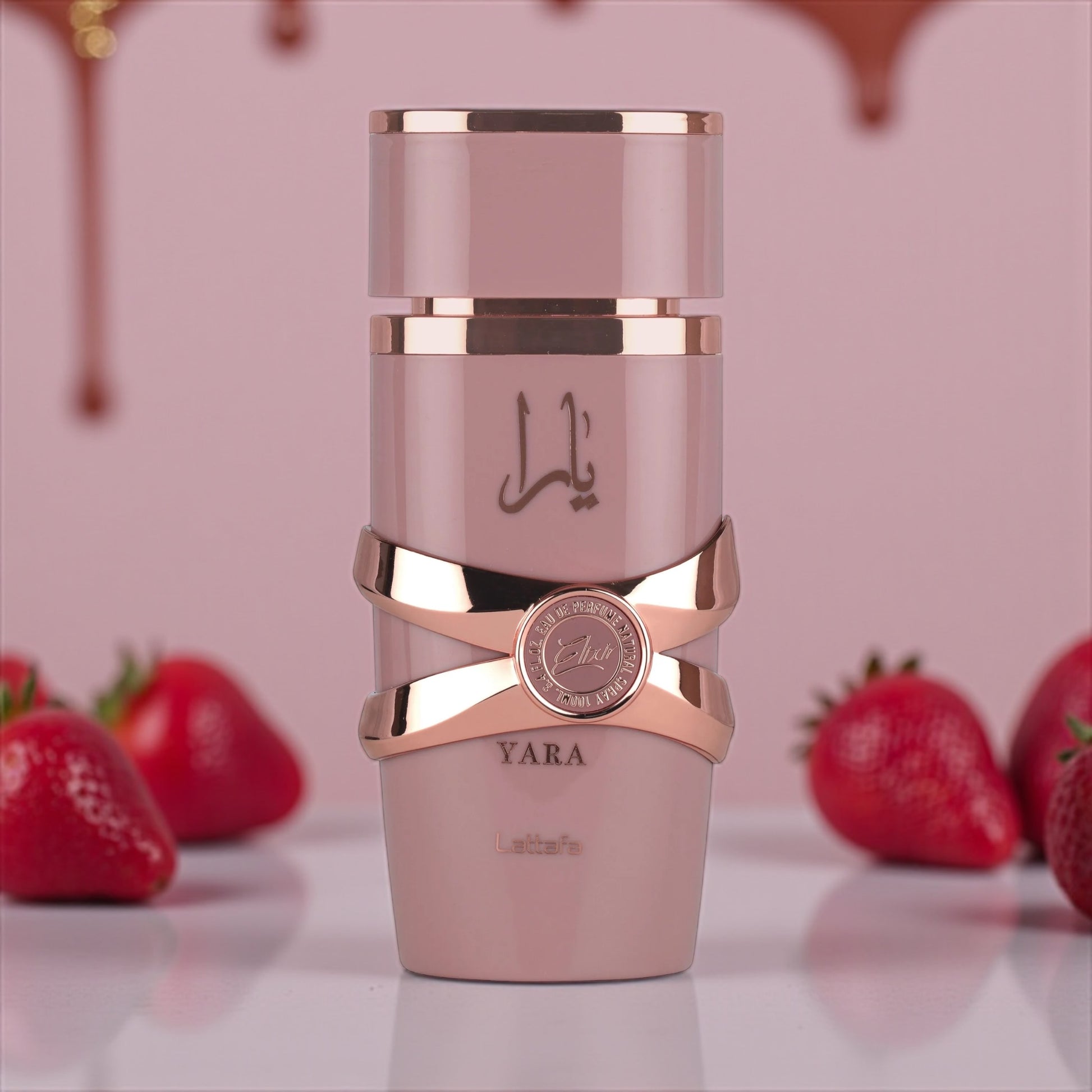 Lattafa Yara Elixir perfume sample – strawberry, caramel and vanilla notes styled in a rich, creamy-toned gourmand setting.