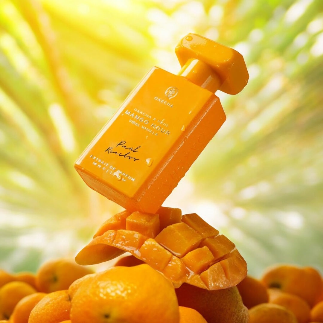 Oakcha Mango Hour Viral Vanilla fragrance sample – tropical mango, coconut and vanilla styled in a playful summer setting.