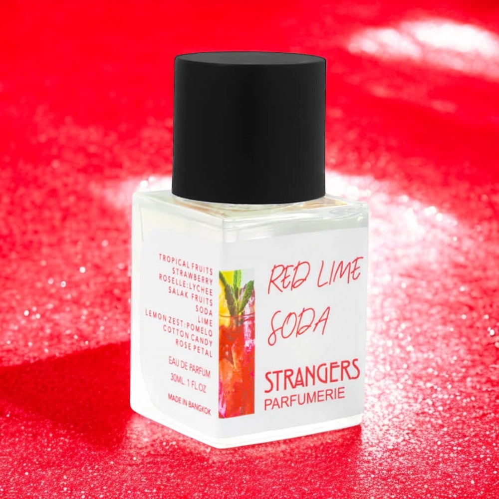 Close-up of a fragrance sample of Red Lime Soda, highlighting its fizzy, fruity, and refreshing notes inspired by Thailand’s summer drink