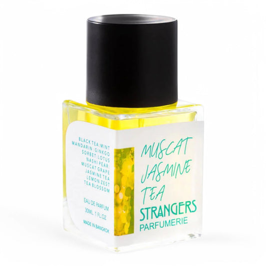 A decant of Strangers Parfumerie Muscat Jasmine Tea, a refreshing tea fragrance with muscat grape, jasmine, and mint, available in perfume samples