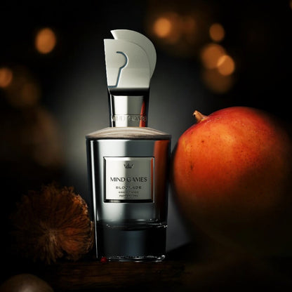 Sample of Mind Games Blockade – a woody, fruity, and leather fragrance blend.