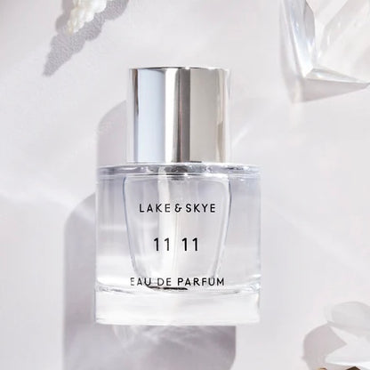 Close-up of a fragrance sample of 11 11, highlighting its crisp, musky, and ethereal notes for a clean and uplifting scent experience