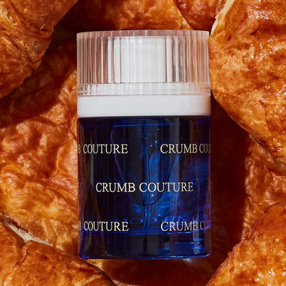 Close-up of a fragrance sample of Crumb Couture, highlighting its buttery, fruity, and warm notes for a scent as indulgent as a fresh pastry