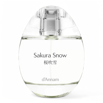 A decant of d’Annam Sakura Snow, a delicate floral fragrance with cherry blossom, snow, and white musk, available in perfume samples