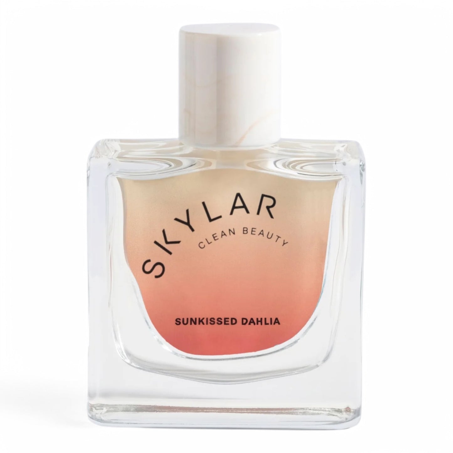 A decant of Skylar Sunkissed Dahlia, a warm floral fragrance with dahlia, vanilla custard, and amber, available in perfume samples