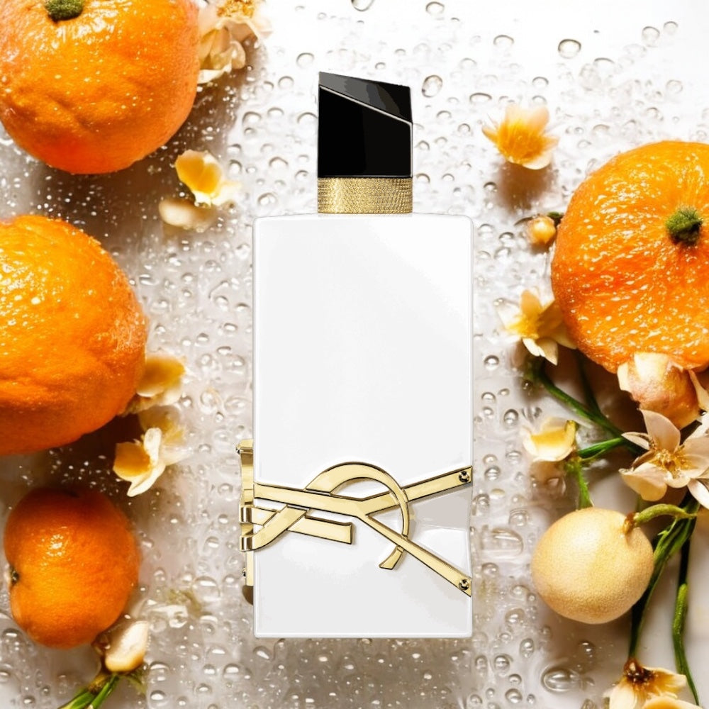 Close-up of a fragrance sample of Libre L'Eau Nue, highlighting its fresh citrus, soft floral, and glowing skin-enhancing formula
