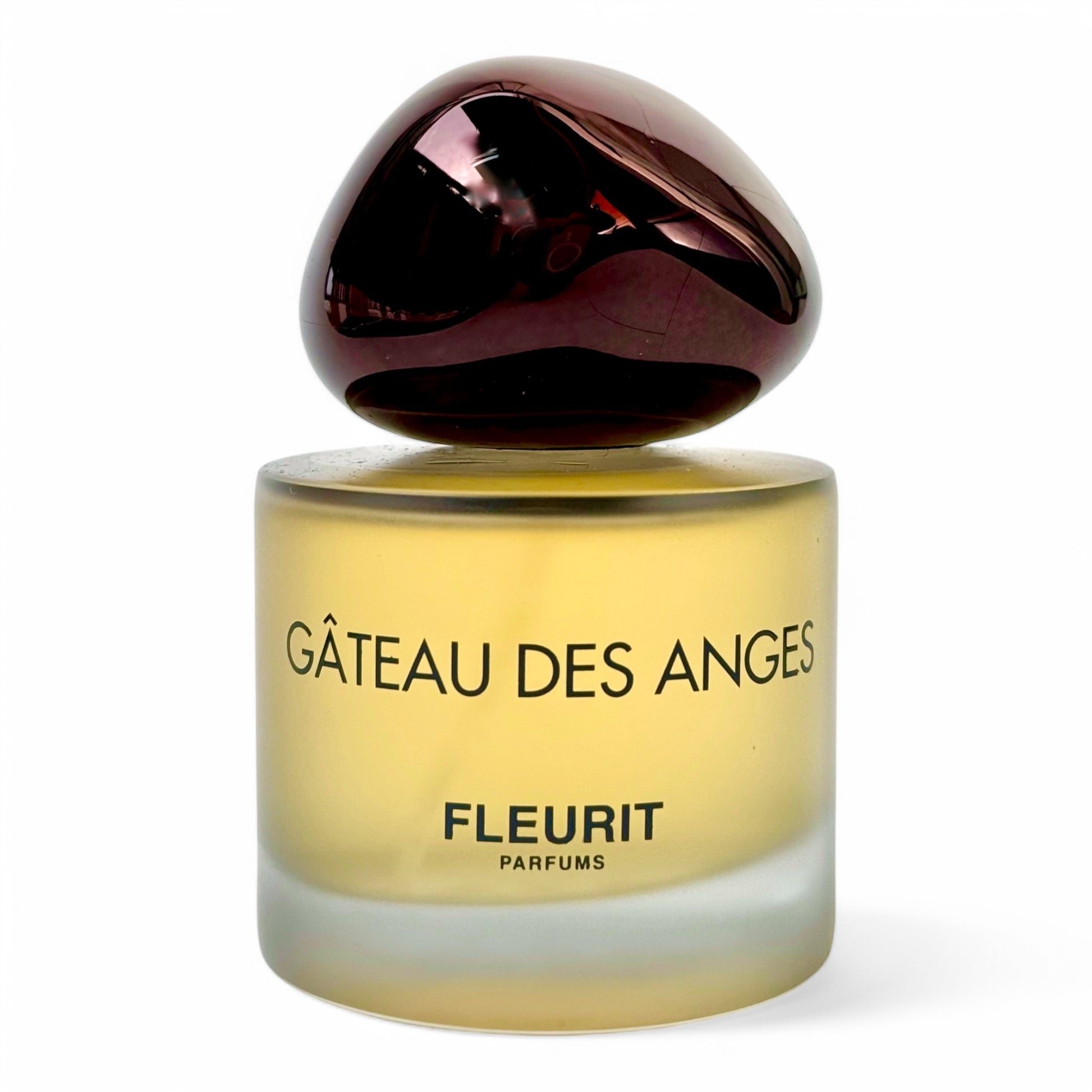 A decant of Fleurit Parfums Gâteau des Anges, a refined gourmand fragrance with vanilla, warm milk, and butter, available in perfume samples.