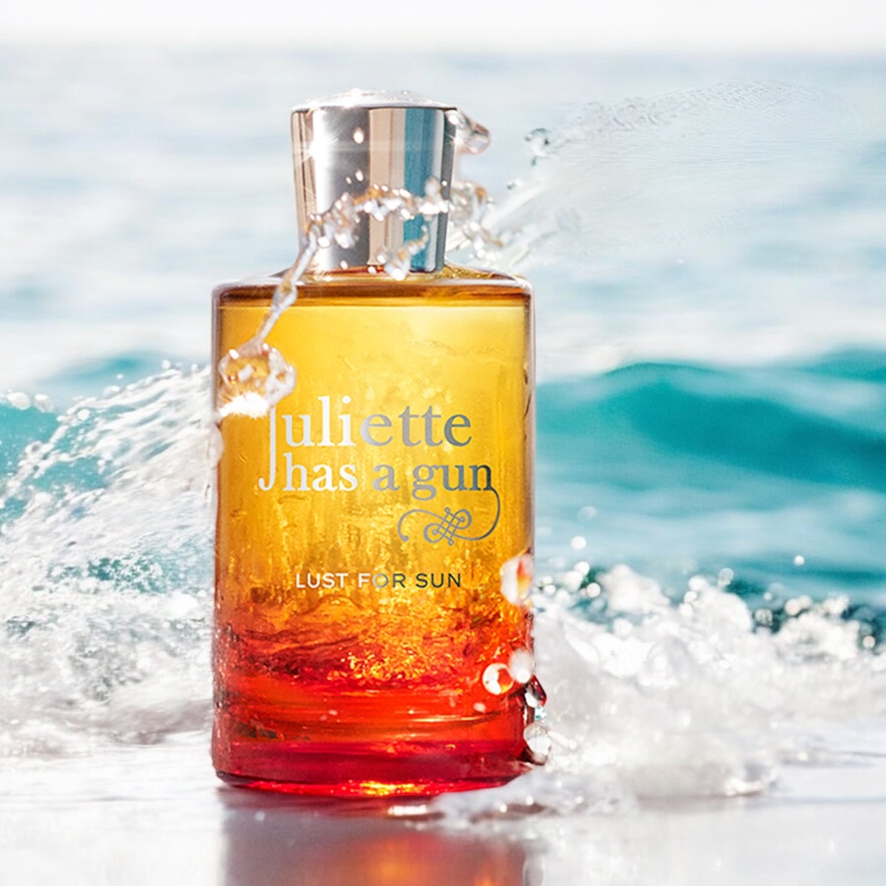 Close-up of a fragrance sample of Lust for Sun, highlighting its tropical floral notes and sun-warmed musky base.