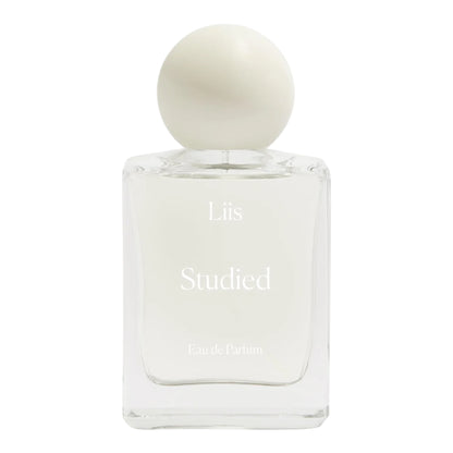 A decant of Liis Studied, a soft musky floral fragrance with pear, orris, and ambrette, available in perfume samples.