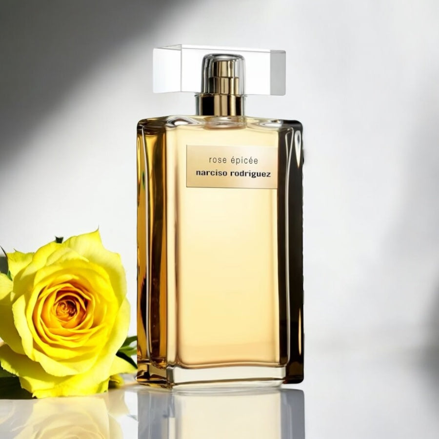 Close-up of a fragrance sample of Rose Épicée, highlighting its warm rose, spice, and musky-amber base for a modern floral scent.