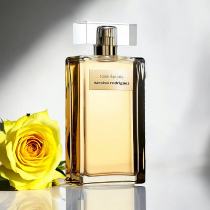 Close-up of a fragrance sample of Rose Épicée, highlighting its warm rose, spice, and musky-amber base for a modern floral scent.
