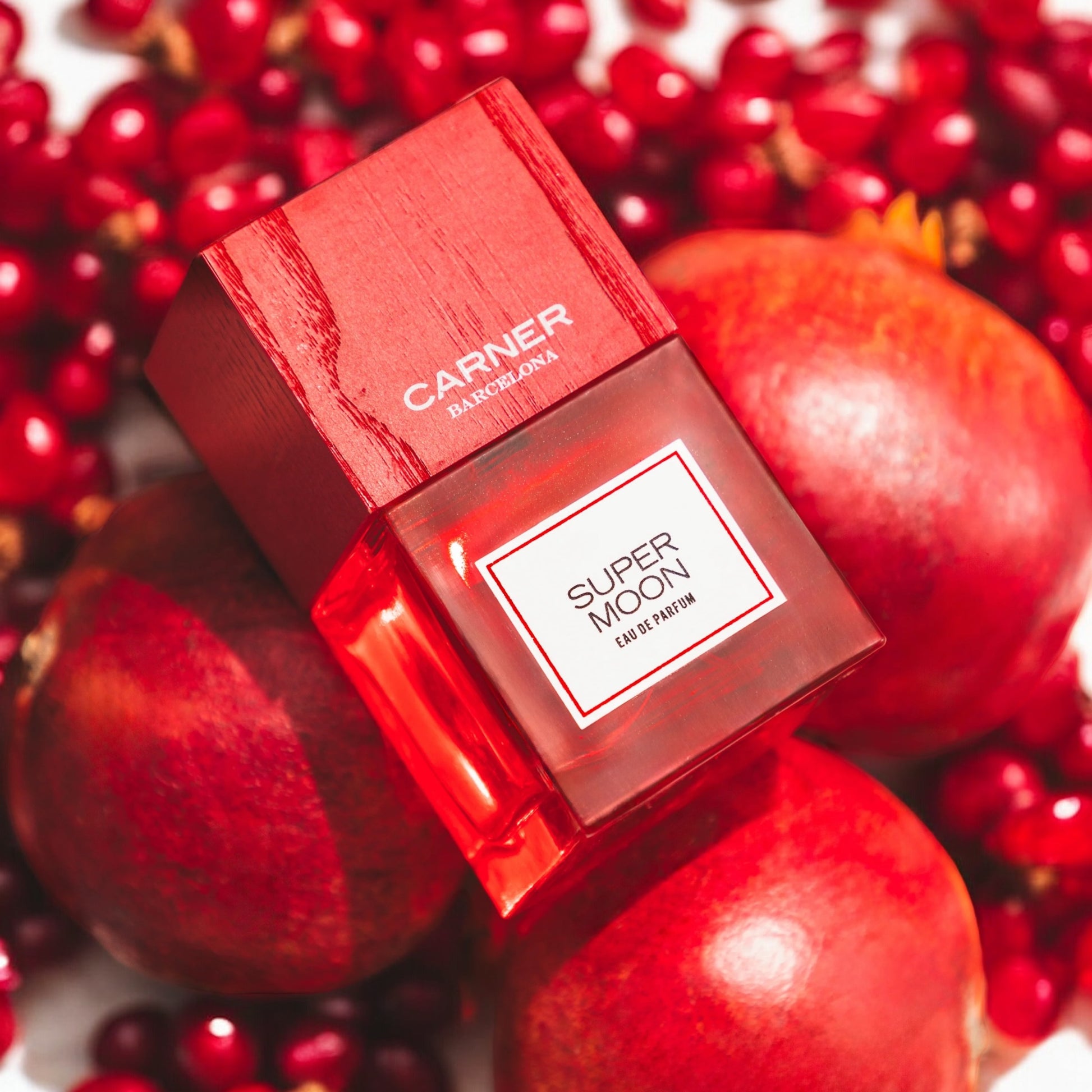 Close-up of a fragrance sample of Super Moon, highlighting its juicy fruit notes, soft florals, and musky-earthy base inspired by summer nights.
