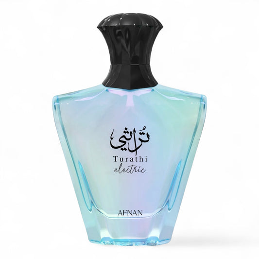 Afnan Turathi Electric perfume sample featuring fresh citrus top notes and smooth amber-musk undertones, available in decants.