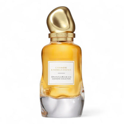 A sample of Donna Karan Cashmere & Vanilla Essence, a cozy gourmand musk fragrance with vanilla, jasmine, and sandalwood, available in perfume decants and testers.