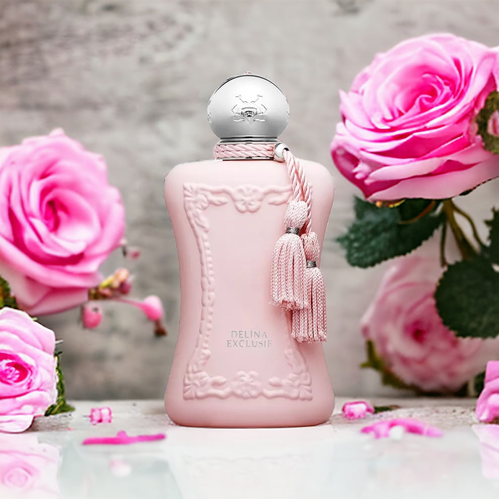 Close-up of a fragrance sample of Delina Exclusif, highlighting its rich rose, fruity top notes, and creamy musky base.
