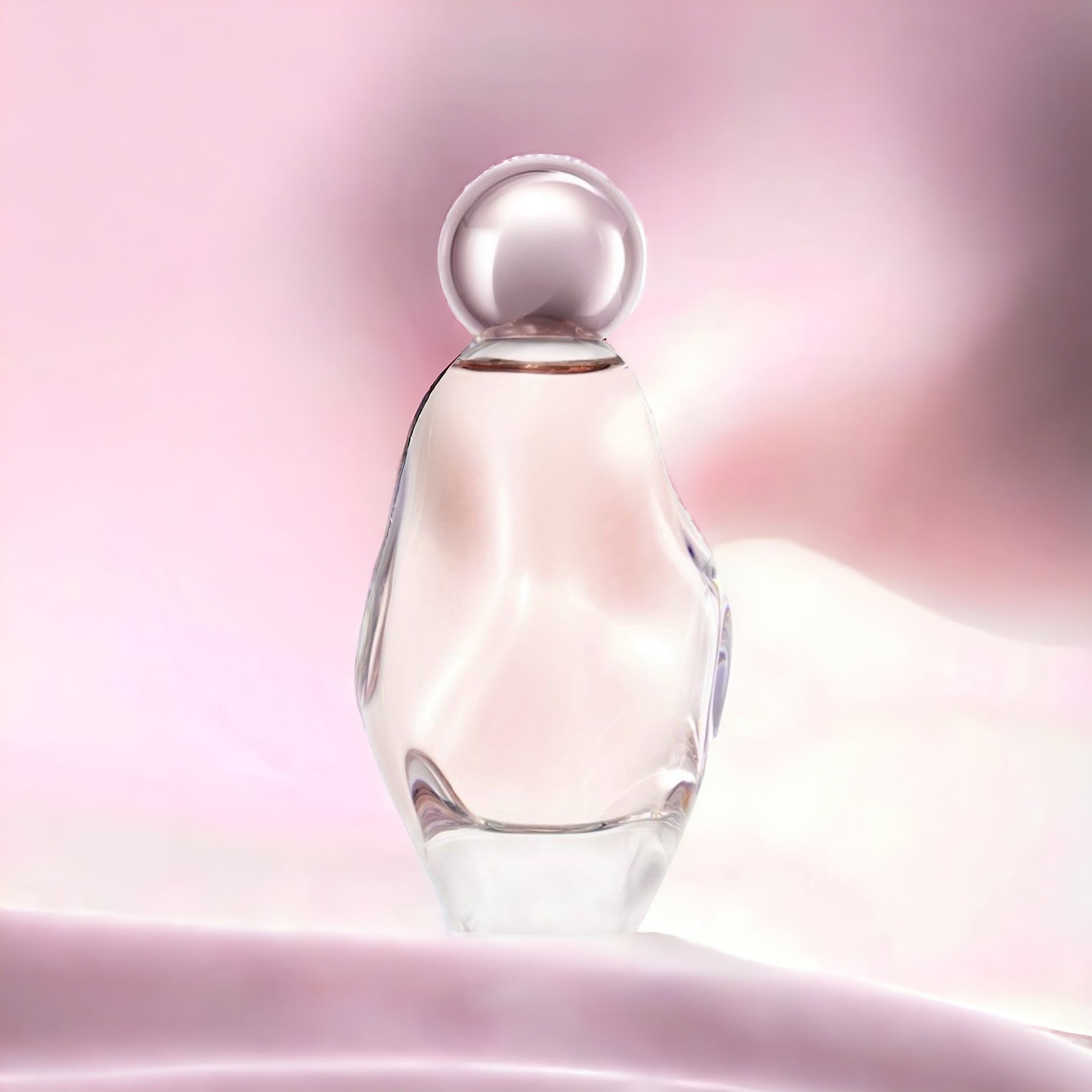 Close-up of a fragrance sample of Cosmic, highlighting its floral, citrus, and warm musky notes for a magnetic and radiant scent