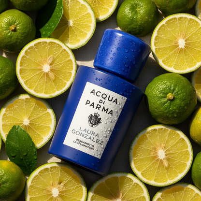 Acqua di Parma Bergamotto La Spugnatura styled with fresh bergamot, Mediterranean citrus and mint leaves