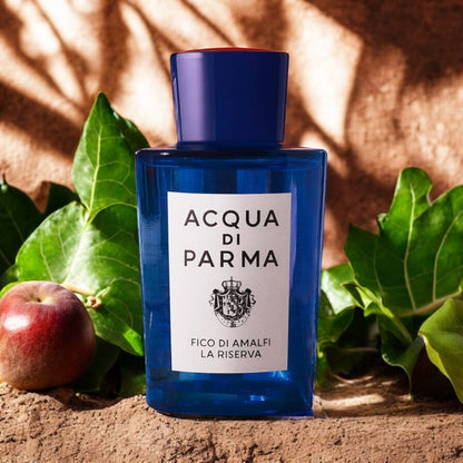 Fico di Amalfi La Riserva perfume sample - fig pulp and sunlit citrus extrait styled in a warm, luxurious Amalfi-inspired setting