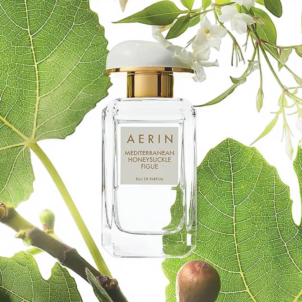 Aerin Mediterranean Honeysuckle Figue perfume sample – sunlit fig and honeysuckle fragrance in a bright Mediterranean-inspired setting.