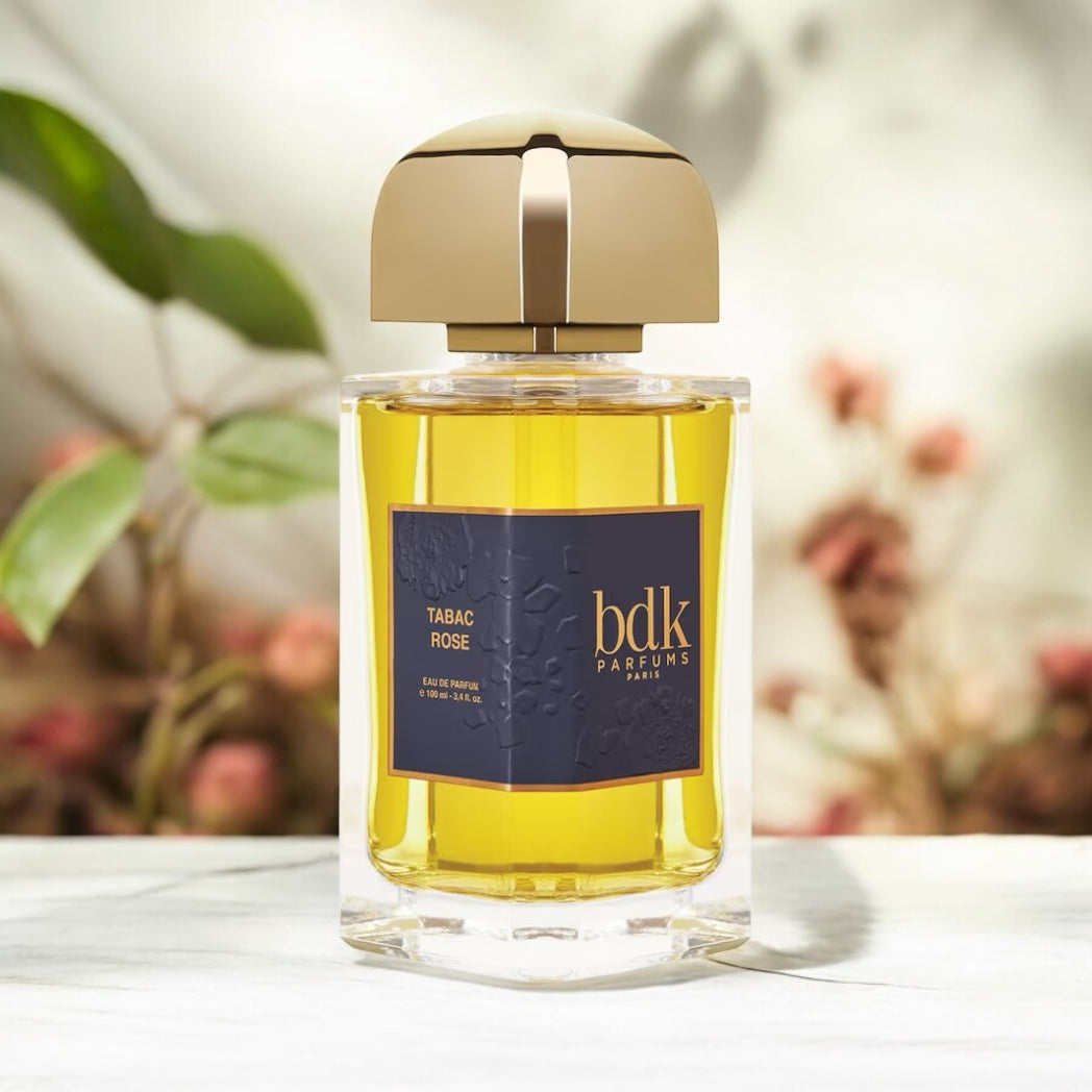 BDK Tabac Rose perfume sample – velvety rose and smoky praline mood in a rich, golden-toned lifestyle setting
