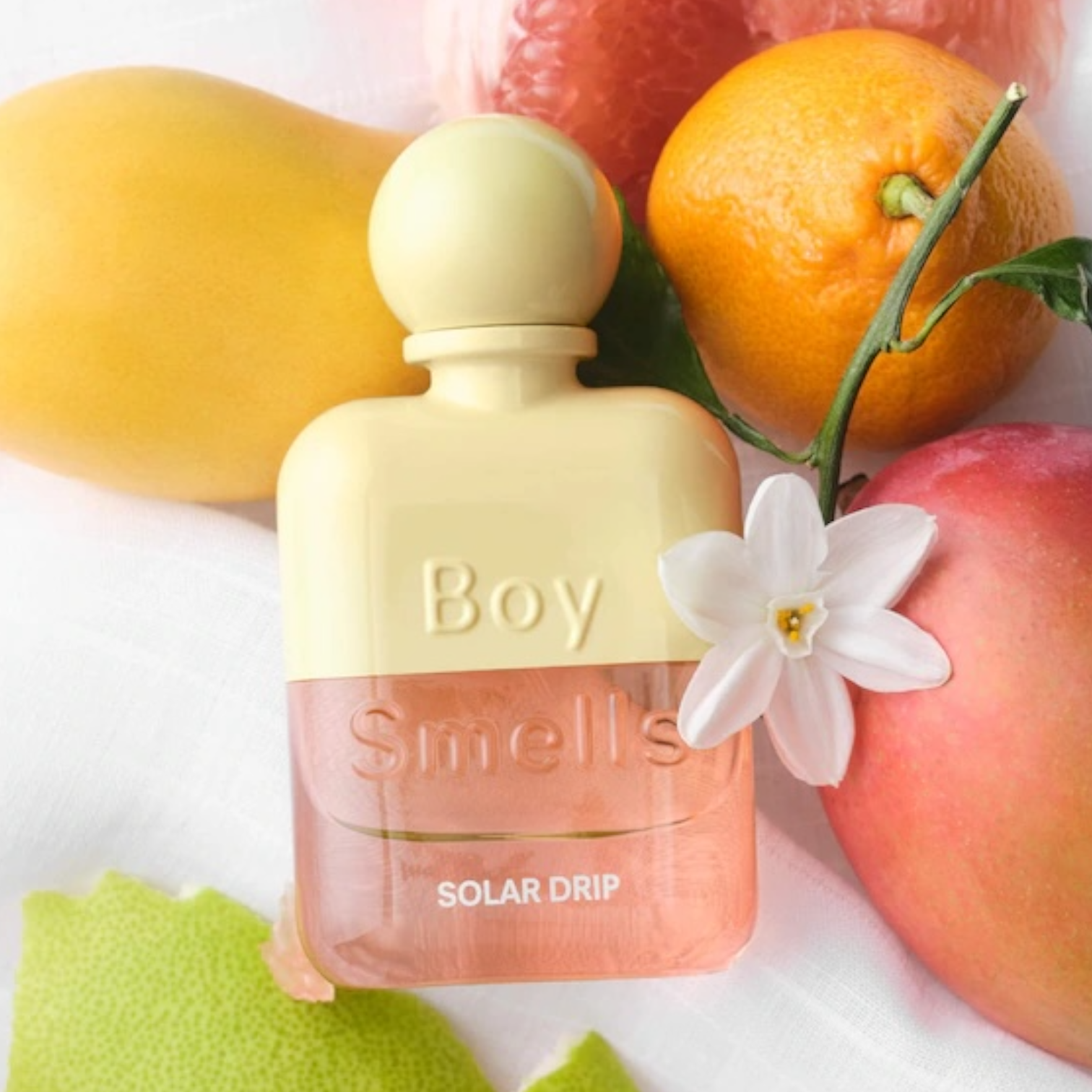 Boy Smells Solar Drip perfume styled in a sunlit, modern setting