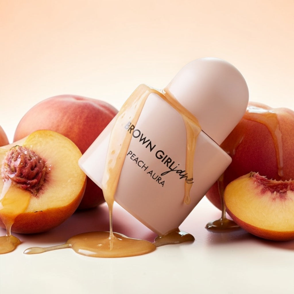 Brown Girl Jane Peach Aura perfume styled with ripe peaches and warm vanilla notes