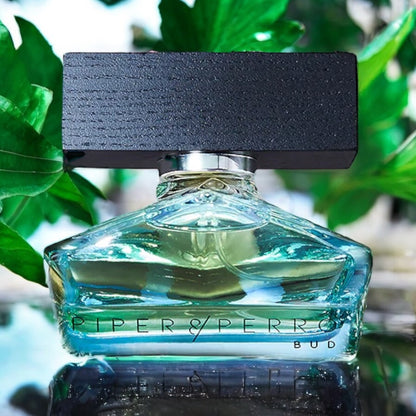 Close-up of Bud perfume sample, a bold scent that blends fruit, rose, and urban textures like concrete and whiskey.