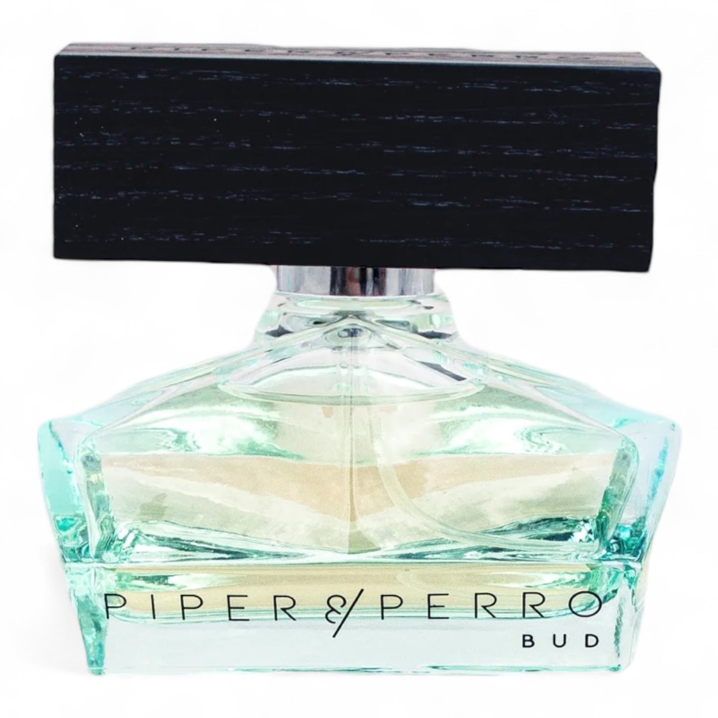 A decant of Piper & Perro Bud, a floral-woody perfume with Bulgarian rose, pineapple leaves, and bourbon, available in fragrance samples.