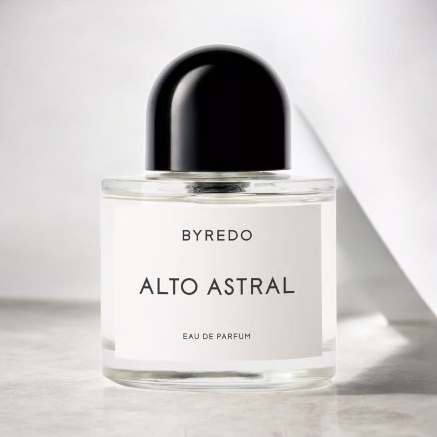 Byredo Alto Astral perfume sample – tropical coconut and salted amber scent styled in a clean, minimal luminous setting