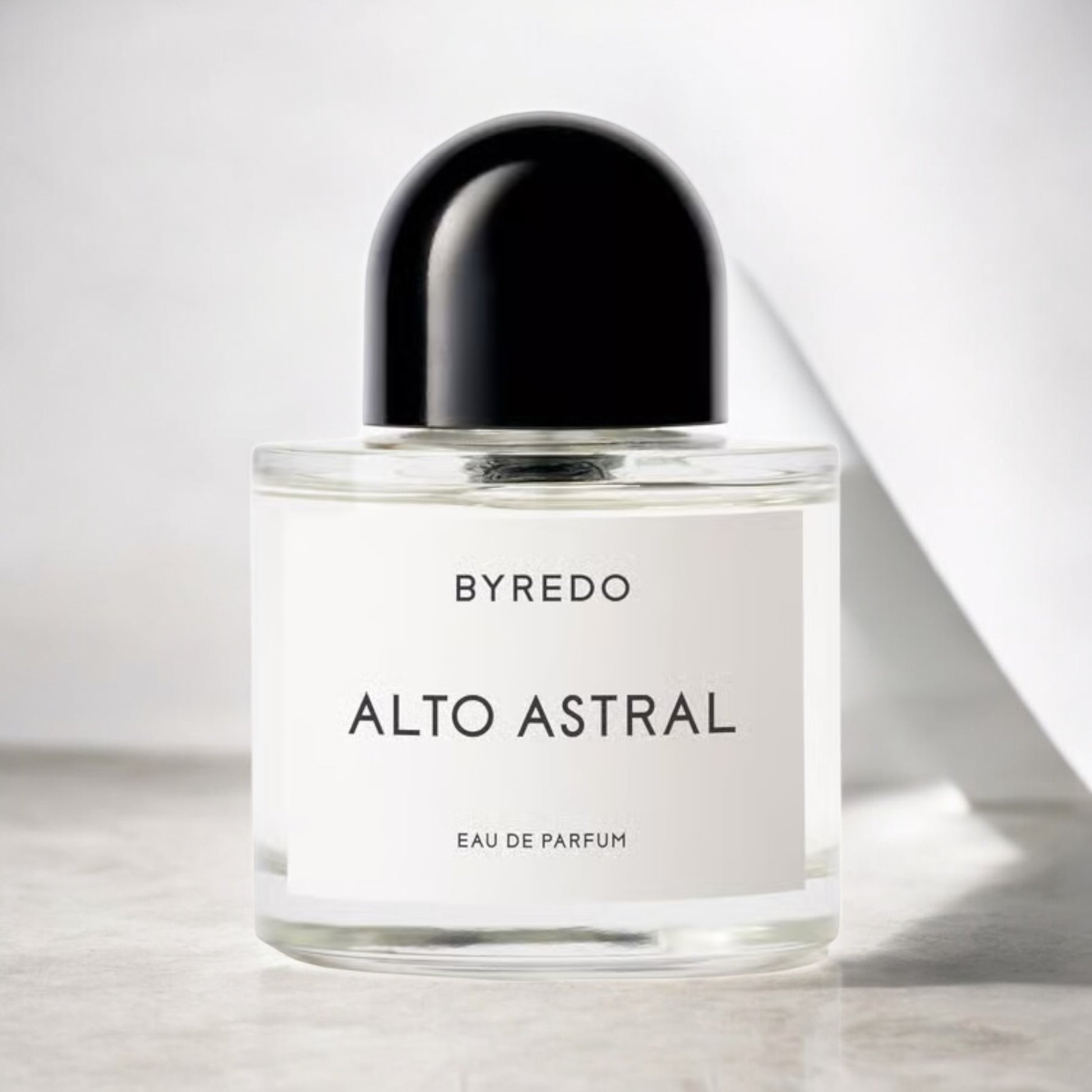 Byredo Alto Astral perfume sample – tropical coconut and salted amber scent styled in a clean, minimal luminous setting