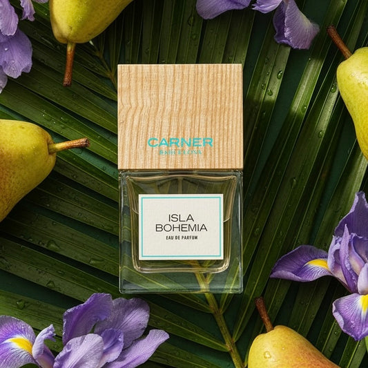 Carner Barcelona Isla Bohemia styled on a palm leaf with fresh pears and iris flowers