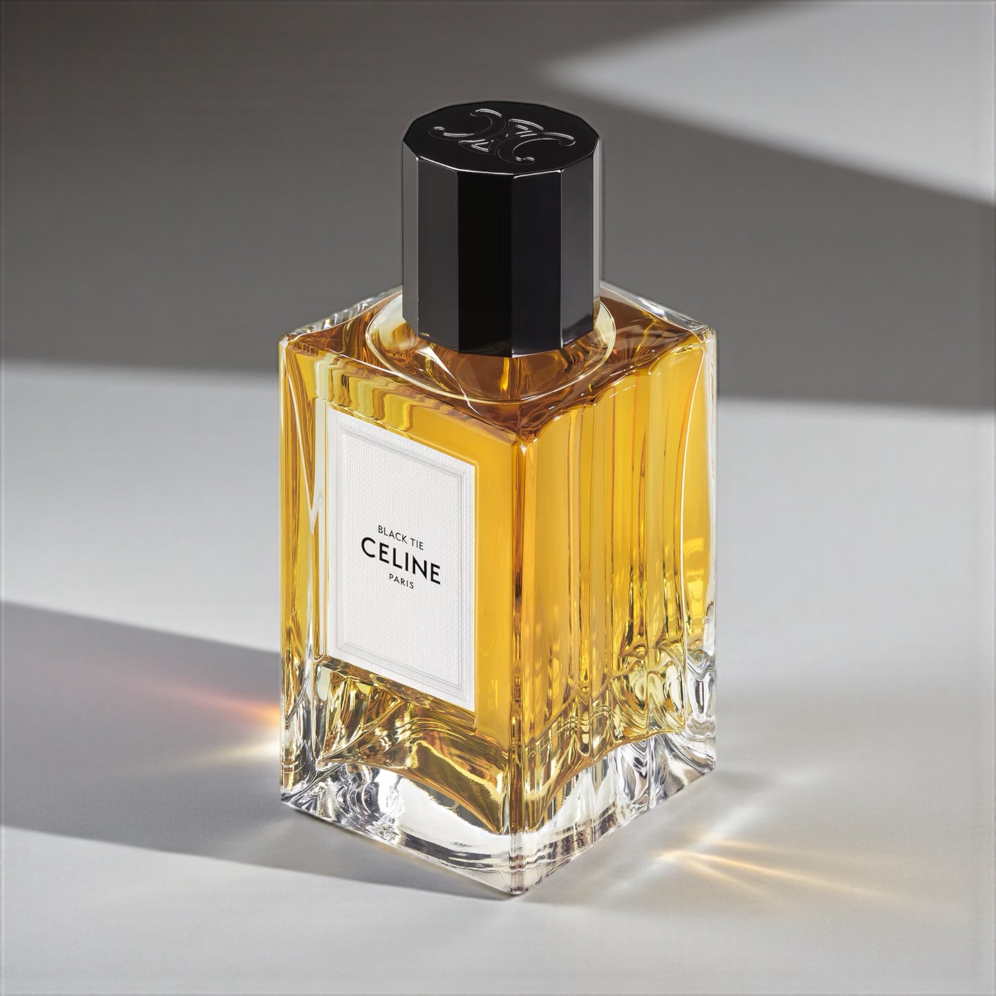 Celine Black Tie perfume sample – powdery vanilla and cedar fragrance evoking black satin and timeless elegance.