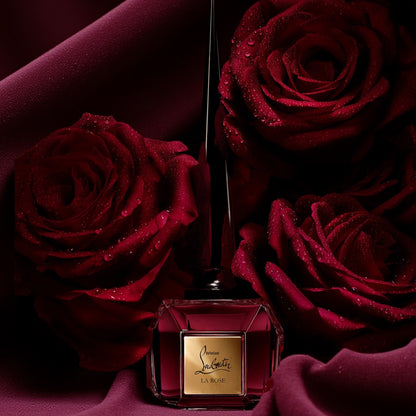 Christian Louboutin Fétiche La Rose perfume sample styled with deep red velvet and dark dewy red roses to reflect its seductive bold character.
