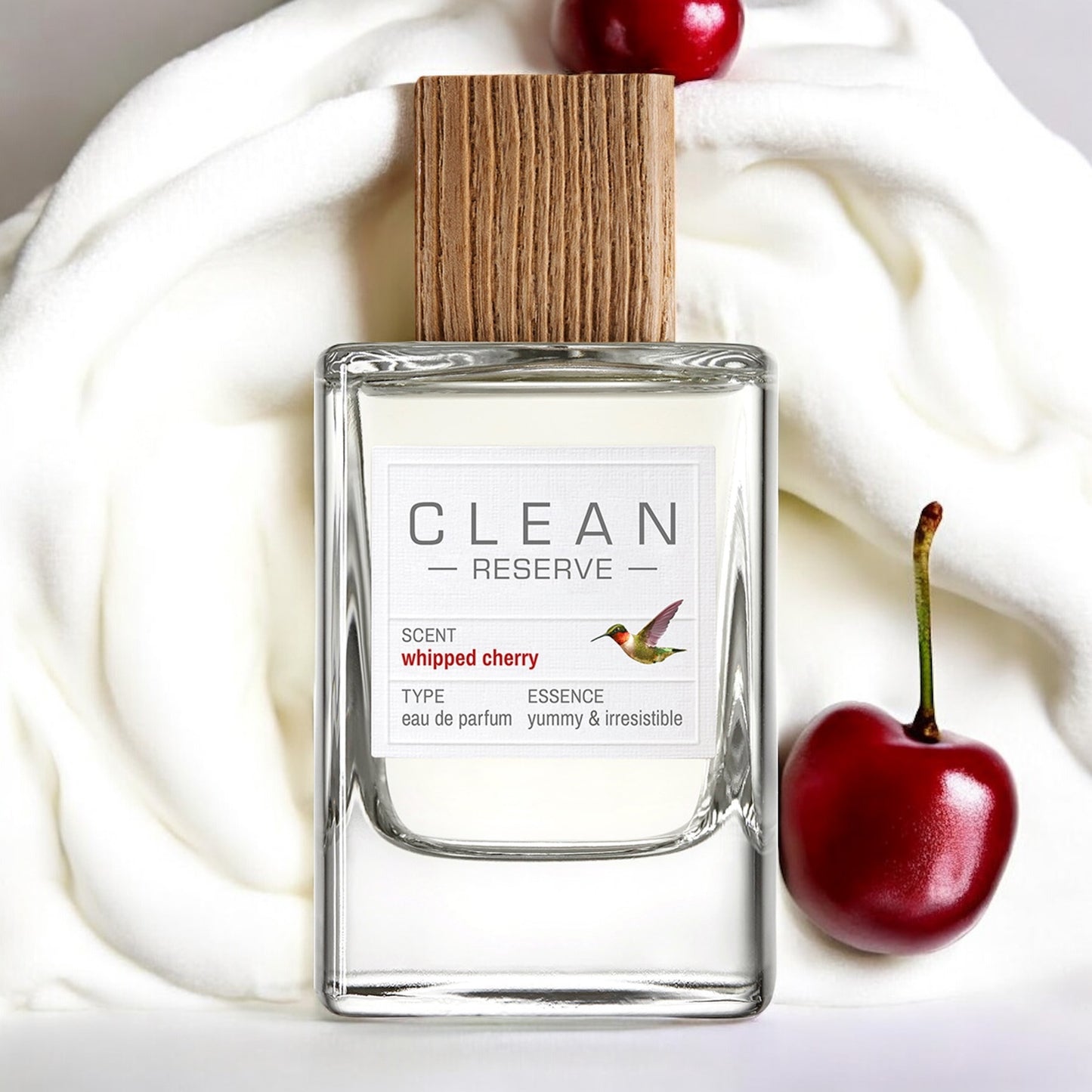 Clean Whipped Cherry fragrance sample – juicy cherry and vanilla cream styled in a playful gourmand setting.