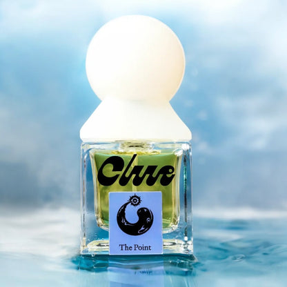 Clue The Point perfume sample - refined floral aquatic fragrance styled with soft aquatic textures in a marine setting