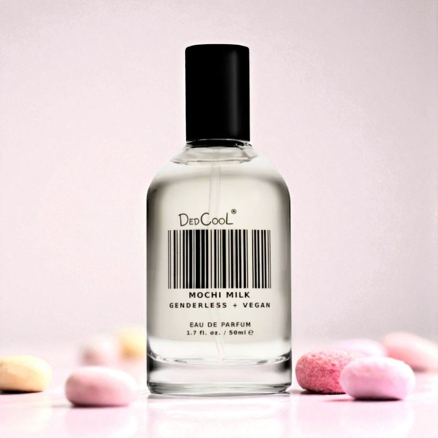 DedCool Mochi Milk perfume sample – peach and marshmallow fragrance styled in a soft, creamy lifestyle setting.