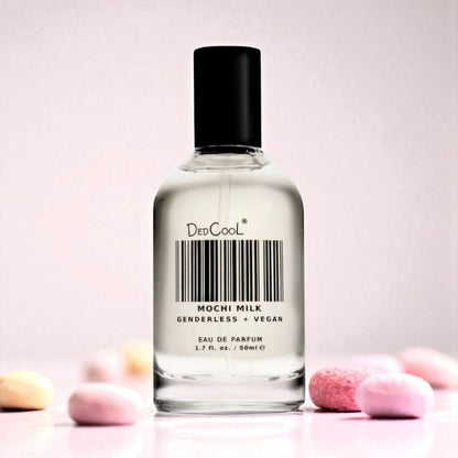 DedCool Mochi Milk perfume sample – peach and marshmallow fragrance styled in a soft, creamy lifestyle setting.