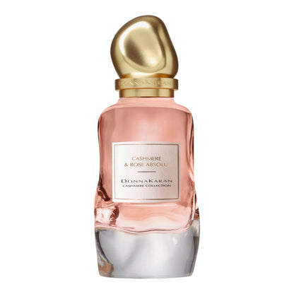 Donna Karan Cashmere Rose Absolu perfume bottle on white background